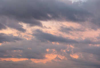 Naklejka na ściany i meble Clouds in the sky at sunset