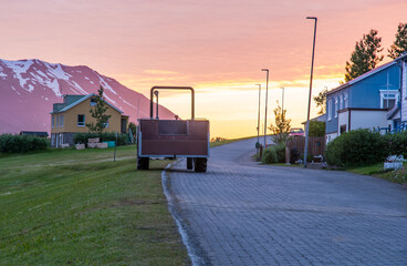 Summer sunset in the village on island of Hrisey in Iceland
