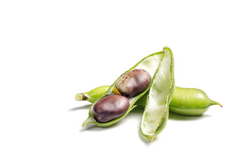 Fresh purple beans in a green pod isolated on white background. String beans with clipping path.