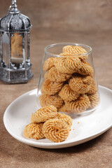 Kukis semprit speculos or biscoff butter cookies, made from butter, egg, flour, speculoos jam, sugar and biscuits crumble.