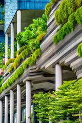 Tuinposter Singapore, Eco-building with plants incorporated into façade © John