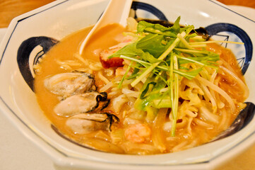 Famous Nagasaki Miso Champon oyster noodle with seafood broth soup served hot for lunch