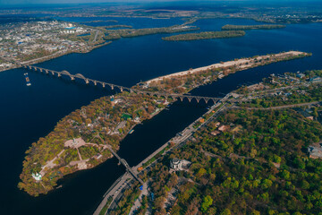 Aerial view of the beach of Monastery Island. Panorama of the city. Dnepr River. City of Dnipro. Ukraine. Leisure and entertainment park named after Taras Shevchenko.