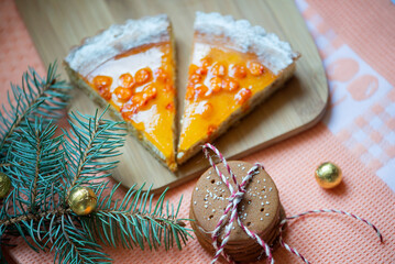 Sweet desser food flatlay with sea buckthorn pie