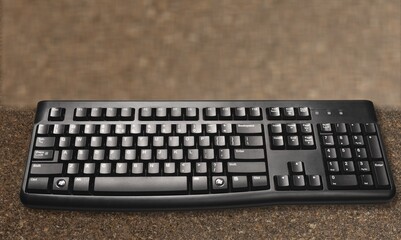 Computer Keyboard on empty desk background