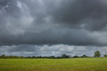 Obraz na płótnie Canvas Anon tywi river, llangadog carmarthenshire Wales, england, UK, united kingdom. Dark clouds, 