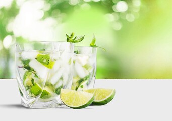 Tasty fresh Ice and mojito in a glass on the table