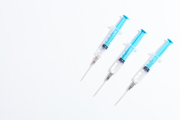 Disposable plastic syringe prepared for injection and vaccination in the hospital. The concept of medicine and health