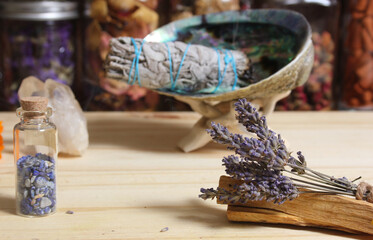 Dried Lavender With Palo Santo Sticks and Abalone Shell For Smudging in Background Shallow DOF