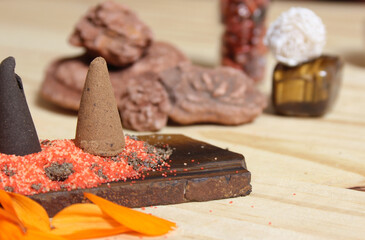 Incense Cones on Stone Slab With Crystals and Flowers
