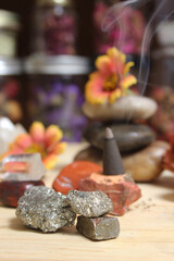 Incense Cone on Stone Slab With Crystals and Flowers