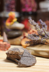 Ancient Native American Pottery Pieces With Crystals and Flowers on Meditation Table