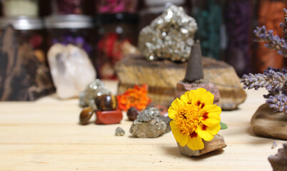 Incense Cone on Stone With Crystals and Flowers. Meditation Table