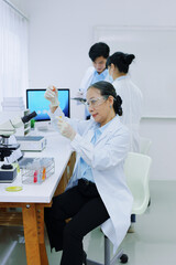 Naklejka premium scientists analyze chemical samples Discuss technological innovations