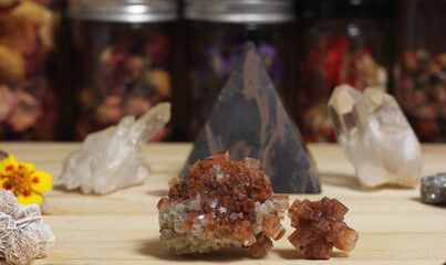 Aragonite Carbonate Crystals With Pyramid in Background