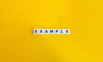 Example Word on Letter Tiles on Yellow Background. Minimal Aesthetics.