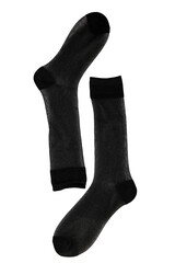 a pair of black socks on a white background
