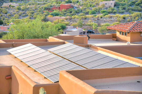 Solar panels on a flat roof of a mediterranean house at Tucson, Arizona