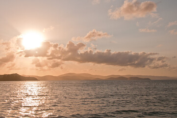 Fototapeta na wymiar Sunset scene of peaceful serene mountain island in the Pacific Ocean of Hamilton Island in Queensland Australia
