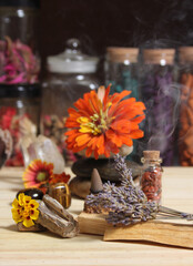 Flowers and Incense Cone With Palo Santo Sticks on Meditation Table