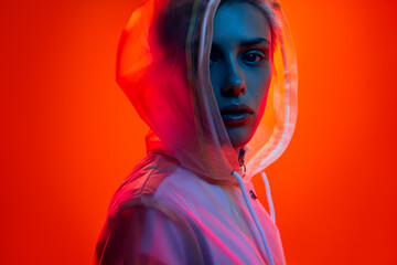 Young woman in futuristic outfit