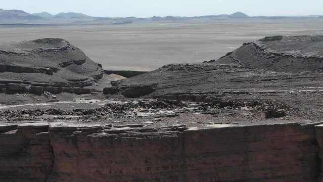 Natural rocky environment of Gara Medouar in Errachidia Moroccan desert region, Morocco. Aerial drone view