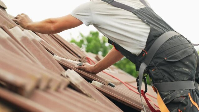 Refixing rooftiles to make space for solar panels installation