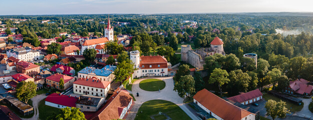 Aerial view of the town of Cesis, located whithin the Gauja National Park in Latvia. - obrazy, fototapety, plakaty
