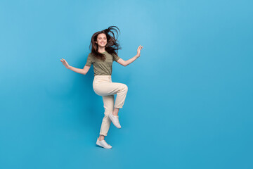 Fototapeta na wymiar Full body photo of funny millennial brunette lady dance wear casual cloth isolated on blue background