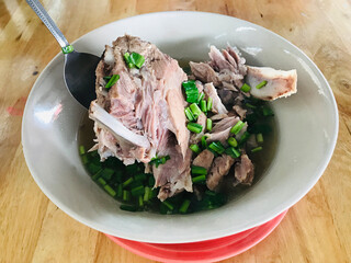 Sour and spicy pork spine soup in Thailand.
