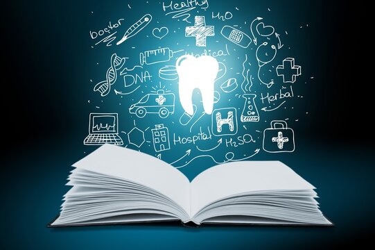 Open medical book with health icons on the desk