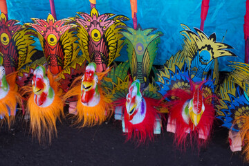 Indonesian children's traditional toy, shaped like an animal with wheels, the toy will make a sound when it is run.