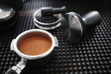 Preparing procress of puck for extration espresso shot.