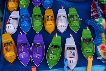 A collection of traditional boat toys in a toy merchant at PKB, Bali. This toy is an old toy that...