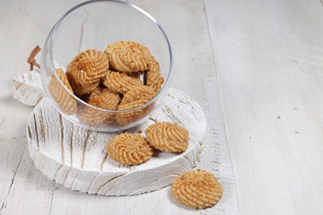 Kukis semprit speculos or biscoff butter cookies, made from butter, egg, flour, speculoos jam, sugar and biscuits crumble.