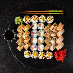 tasty sushi on the black background