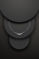 Silver necklace on black background. Uniqe shadow effect - obrazy, fototapety, plakaty