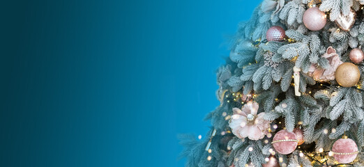 Fototapeta banner. blue christmas decoration, postcard. on the tree a snowflake, balls and a garland obraz