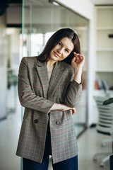 Portrait of young business woman in office