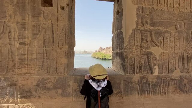 view of the nile river from a window in the Temple of Philae dedicated to Isis, goddess of love. Aswan. Egyptian