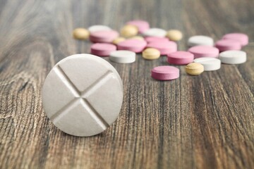 Set of pills drug on desk background