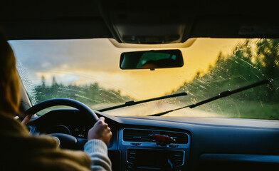 Driving car in bad weather conditions. Heavy rain. - obrazy, fototapety, plakaty
