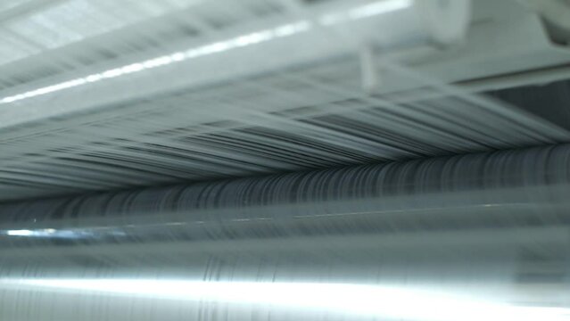 Polymer thread making machine in action