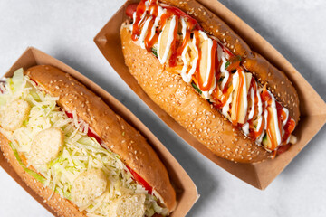 Fast food hot dog banner on a light grey stone textured background, hotdog menu template, hotdog menu mock up, free space for text, different hot dog types