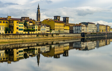 The Florence riverbank of Arno river with the Florence National Central Library.