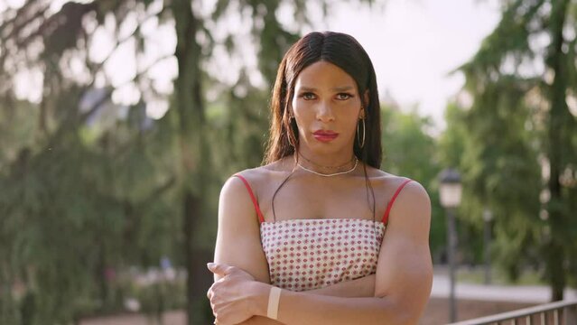 Beautiful rans woman crossing arms