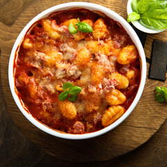 Baked potato gnocchi with tomato sauce and basil