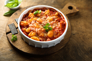 Baked potato gnocchi with tomato sauce and basil