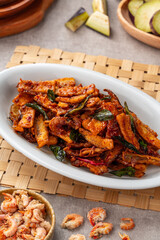 Terong goreng or fried eggplant with dried shrimps and sambal.