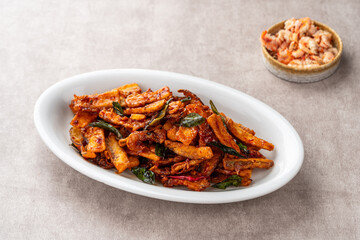 Terong goreng or fried eggplant with dried shrimps and sambal.